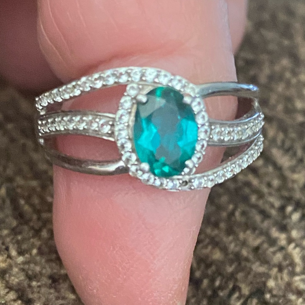 Sterling Silver With Oval Created Emerald and Round Created White Sapphire Ring